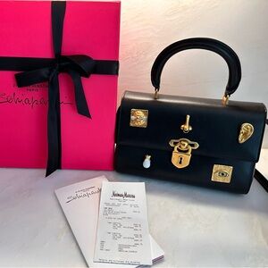 Schiaparelli bag.  Very unique.  Purchased in 2024 for 8,984.00. Carried 1 time.